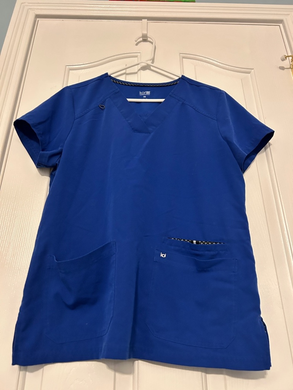 Koi Women’s Next Gen Deep Blue Scrub Top — Size Medium